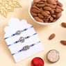 Peacock N Floral Rakhi Trio With Almonds