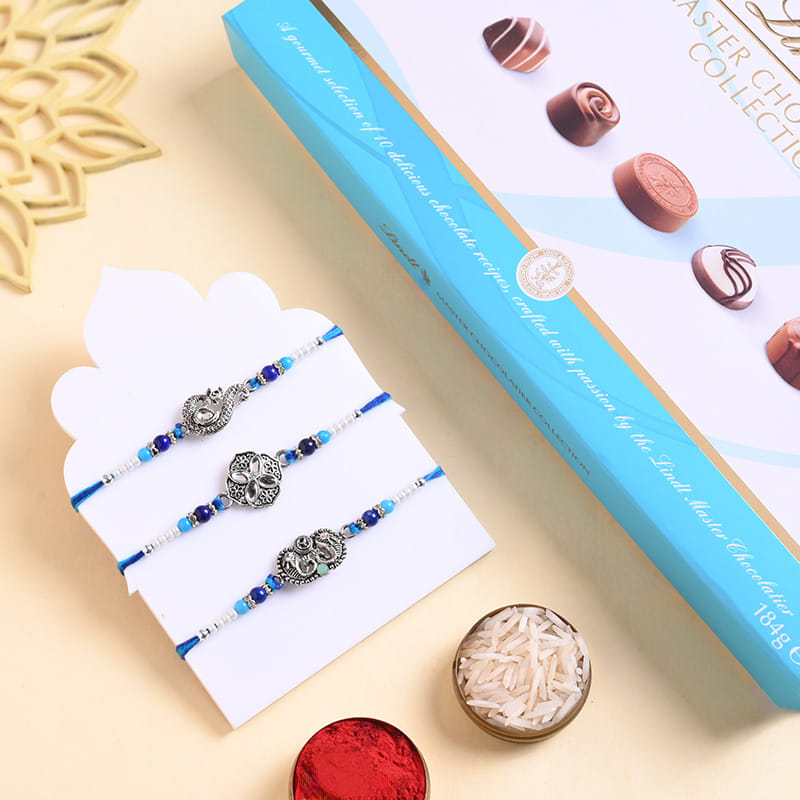 Peacock N Floral Rakhi Trio With Chocolate Box