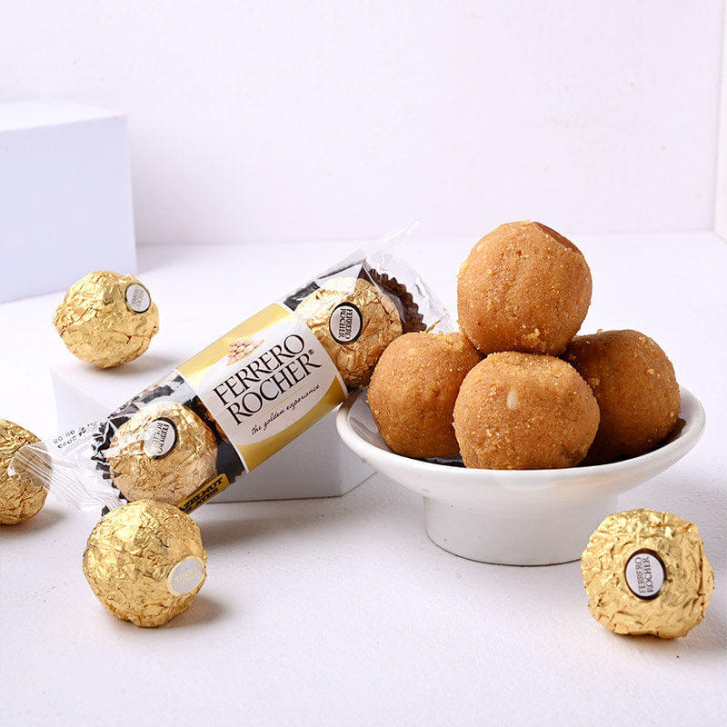 Send Peacock Rakhi Duo With Ferrero Rocher N Besan Ladoo to Canada Online