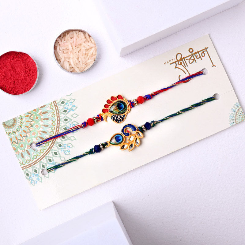 Send Peacock Rakhi Duo With Ferrero Rocher N Besan Ladoo to Canada Online