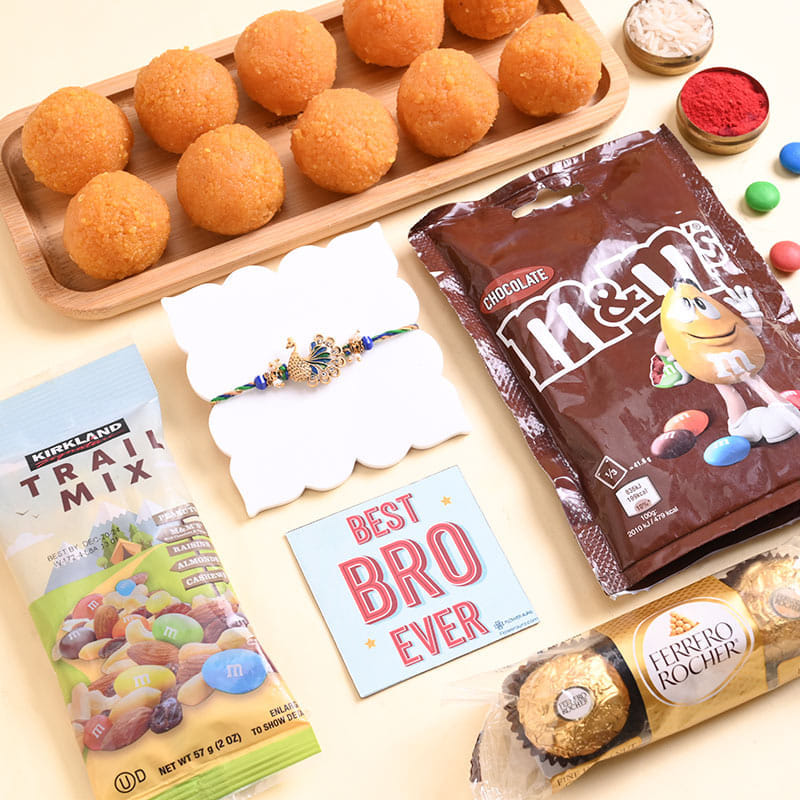 Peacock Metallic Rakhi N Sweet Treats Hamper