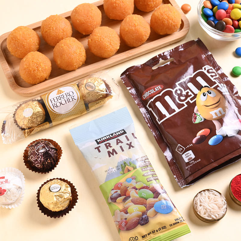 Peacock Metallic Rakhi N Sweet Treats Hamper