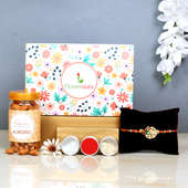 Peacock Rakhi Signature Box - One Peacock Rakhi with Roli and Chawal with Roasted Almonds and Mixed Dry Fruits and One Floweraura Signature Box
