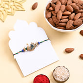 Peacock Rakhi With Almonds