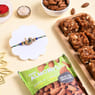 Send Rakhi to UK Online with Peacock Rakhi, Almonds and Dhoda Burfi
