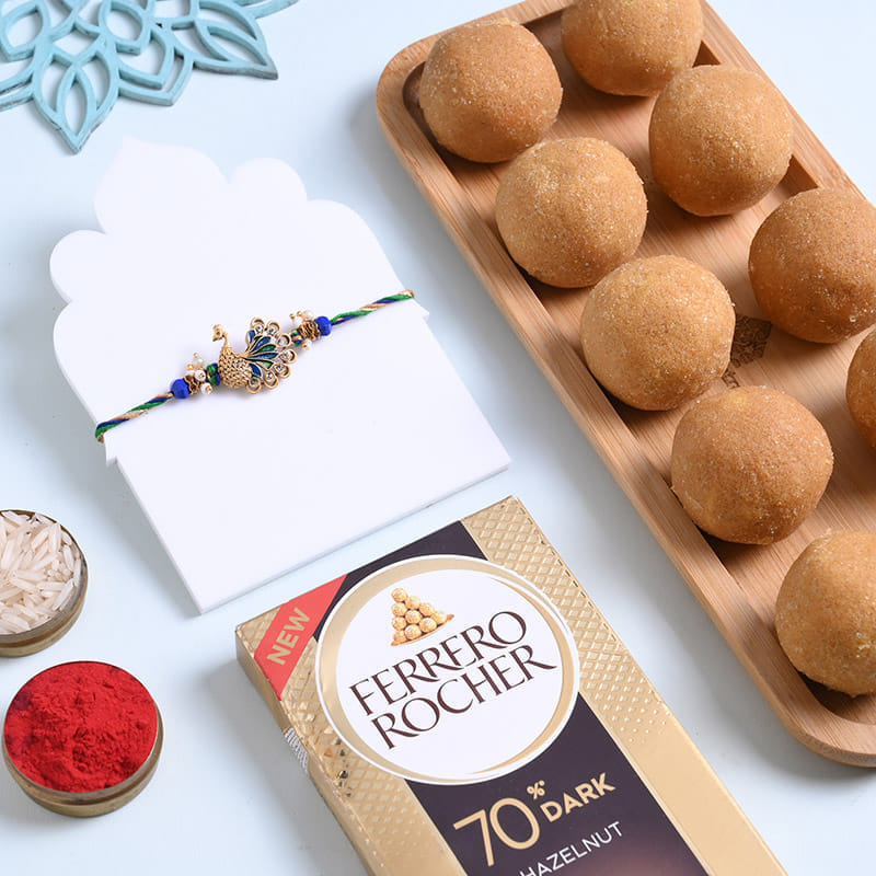 Peacock Rakhi With Chocolate N Besan Ladoos