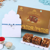 Pearl Evil Eye Rakhi With Dodha Burfi