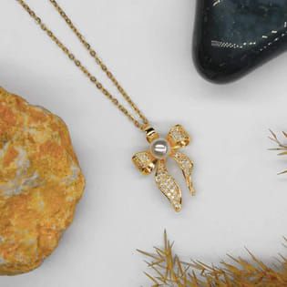 Pearl N Crystal Bow Pendant