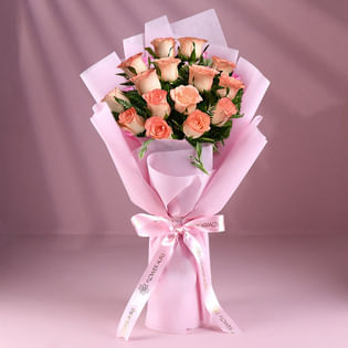 Pink Blooms In Glass Elegance