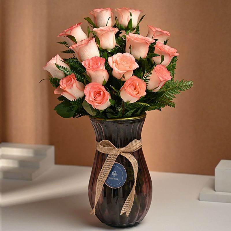 Pink Blooms In Glass Elegance
