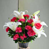 Pink Carnations And White Oriental Lilies In Vase