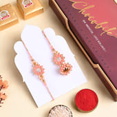 Pink Floral Bhaiya Bhabhi Rakhi Set With Sweets