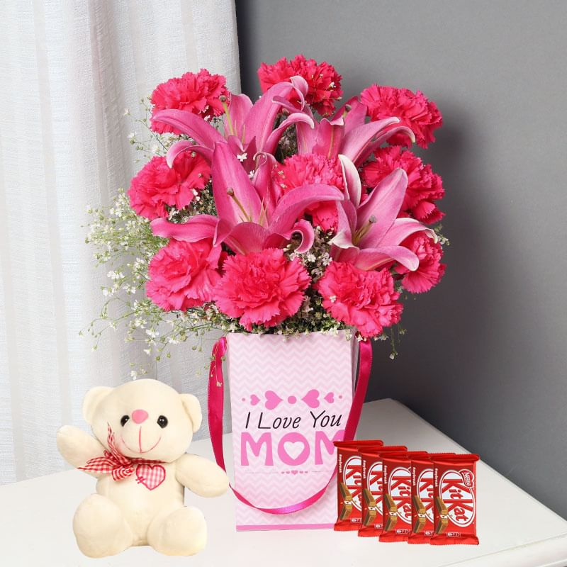Pink Flower Choco Teddy - Bunch of 10 Pink Carnations and 2 Pink Lilies and Mom Flower Box and 5 Nestle Kitkats