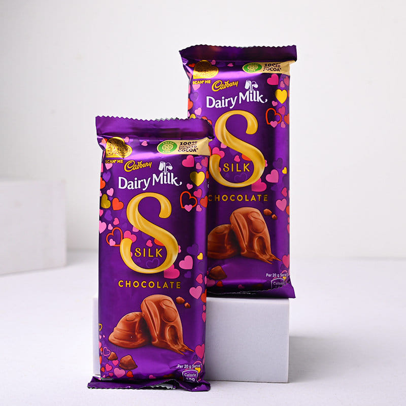 Pink Meenakari Rakhis With Cadbury Dairy Milk Bars