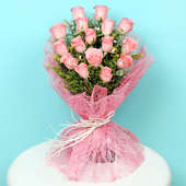 Bouquet of 12 Pink Roses in Pink Jute Packing