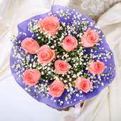 front View of Bouquet of 10 Pink Roses in Purple Paper