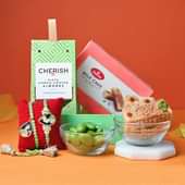 Order Bhaiya Bhabhi Rakhi Set - Healthy Pista Coted Chocolate Almonds N Creamy Milk Cakes With Bhai Bhabhi Rakhi