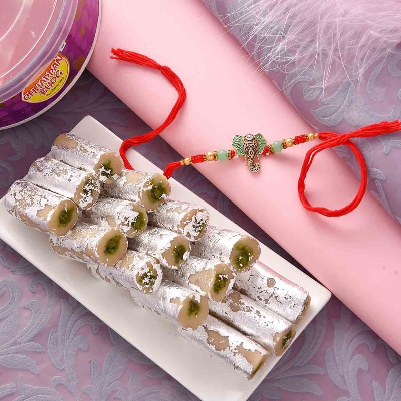 Pista Roll With Designer Ganesha Rakhi