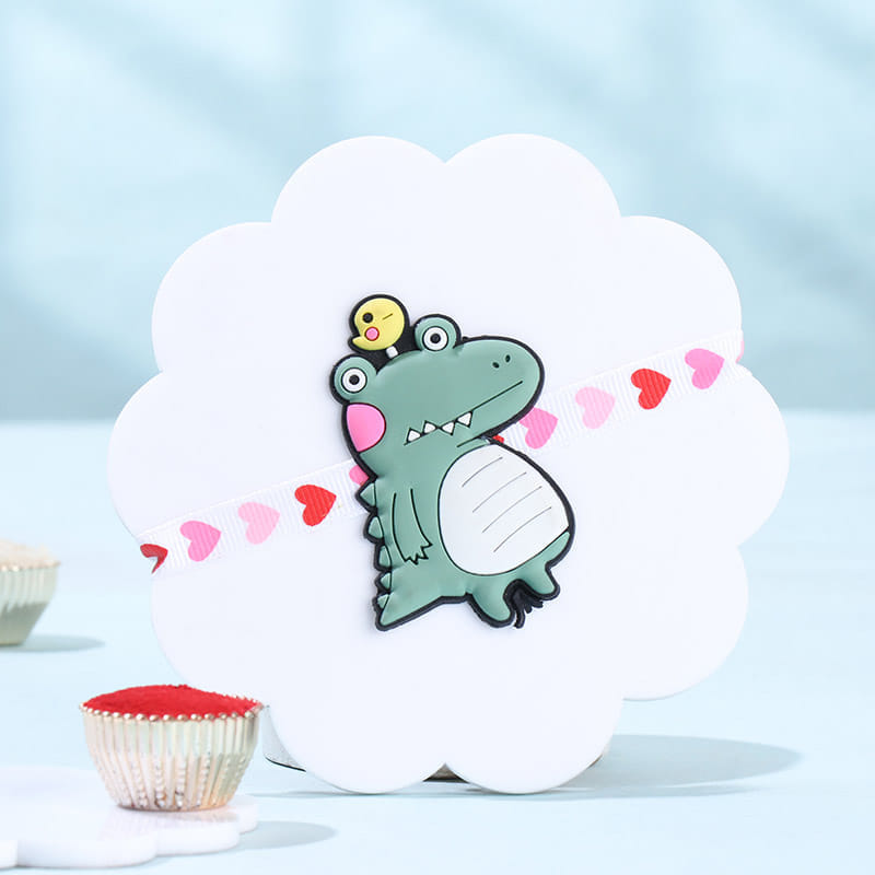 Playful Dino Rakhi With Hazelnut Rocks