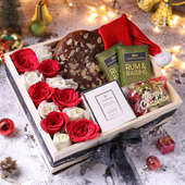 Plum Cake With Santa Cap Candle Roses N Christmas Decor