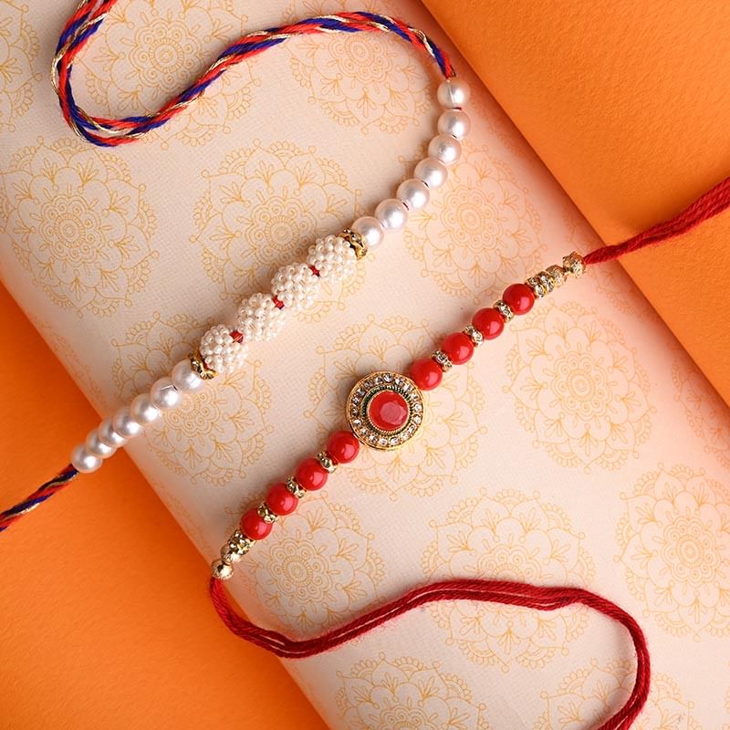 Send Designer Plush Light Pink N Red Rakhi Set Online - Pearl Rakhi