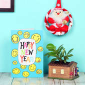 Poise Peperomia Xmas HNY Combo - Foliage Plant Indoors in Sweet Hut Vase with New Year Greeting Card and Hanging Santa