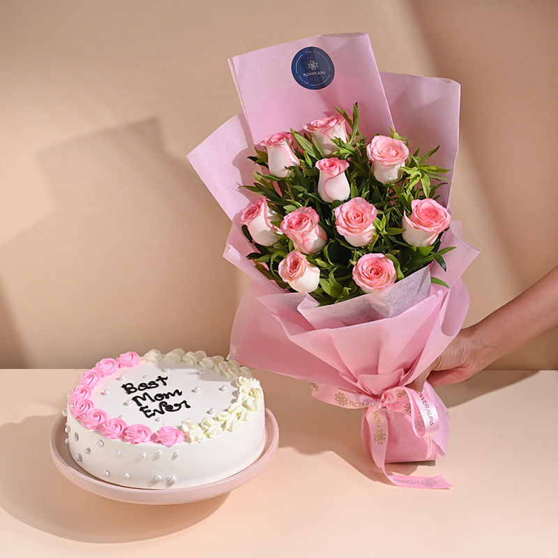 White Frosted Cake with Pink Rose Bouquet