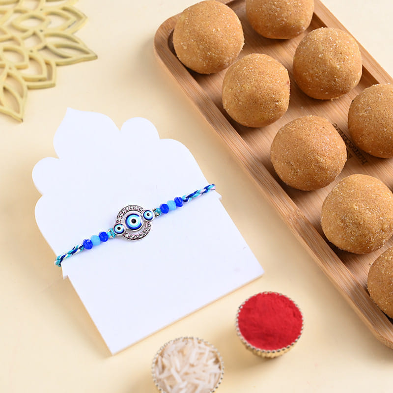 Protective Evil Eye Rakhi With Besan Ladoo