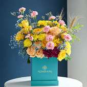 Radiant Blooms Assortment In Blue Box
