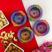 Radiant Four Diyas With Almonds And Cashews