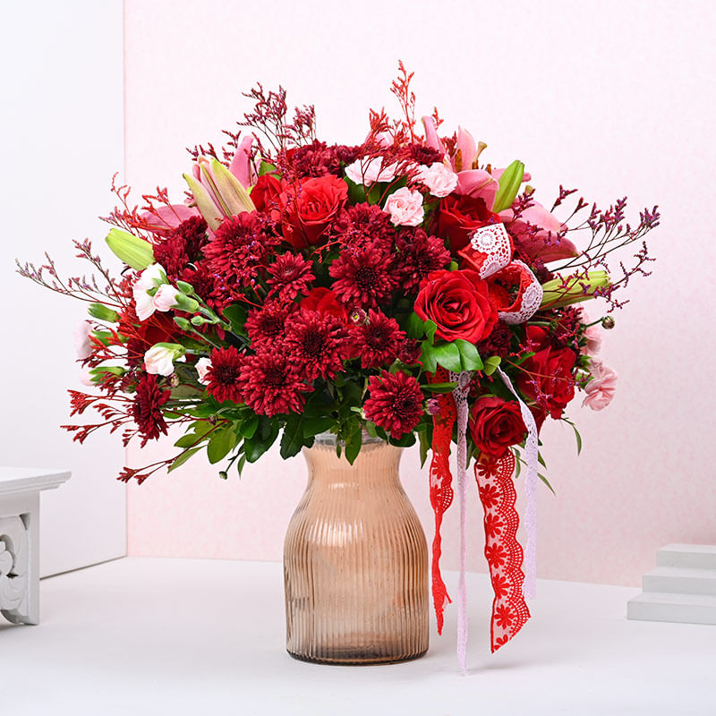 Radiant Red Floral Elegance In Brown Vase