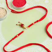 Radiant Red Stone And Pearl Rakhi