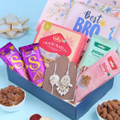Radiant White Bhaiya Bhabhi Rakhis N Treats Hamper