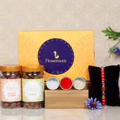 Raisin Rakhi Signature Box - One Rudraksh Rakhi with Complimentary Roli and Chawal and 100gm Raisins in Plastic Container and 100gm Choco Raisins in Plastic Container and One Floweraura Signature Box