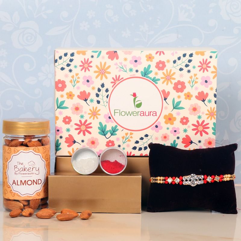 Rakhi Nut Hamper - One Designer Rakhi with Roli and Chawal and Almonds and One Floweraura Signature Box