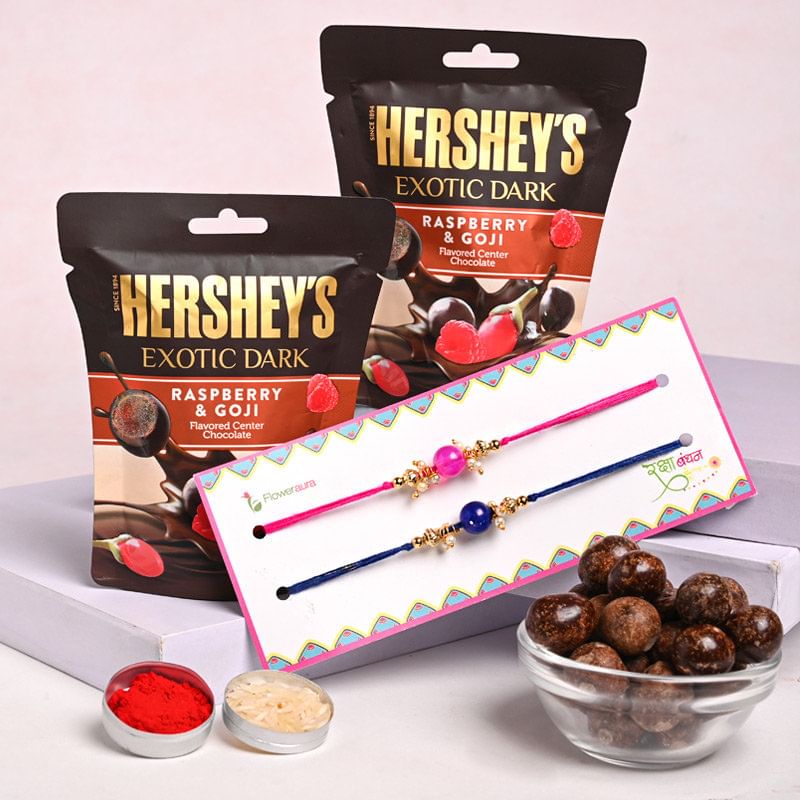 Raspberry Chocolates With Colorful Bead Rakhis: Rakhi set of 2 with sweets