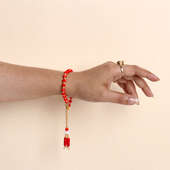 Red Beads Lumba Rakhi For Bhabhi