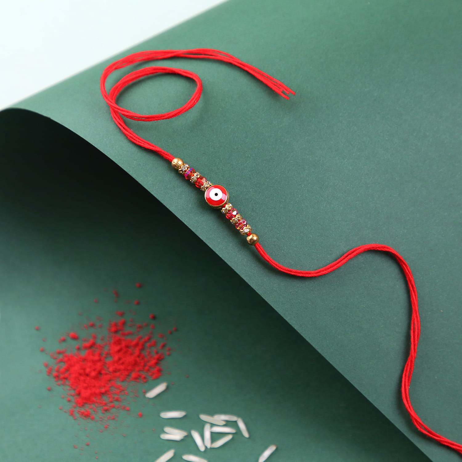 Red Evil Eye Rakhi With Photo Fridge Magnet