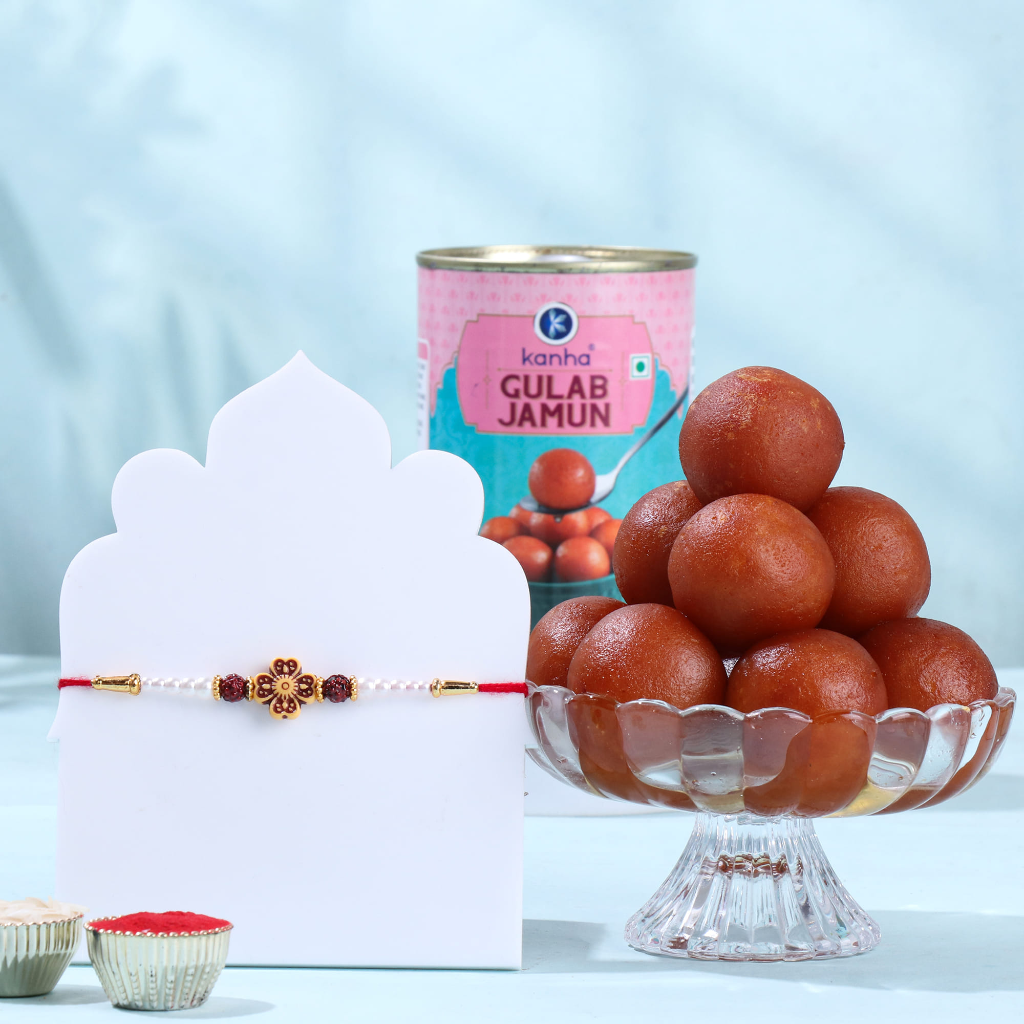 Red Floral Rakhi With Gulab Jamun
