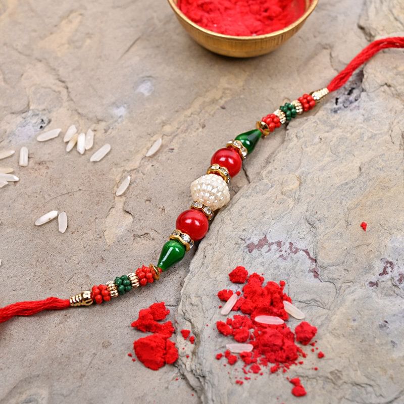 Green And Red Beads Rakhi: Rakhi to Germany