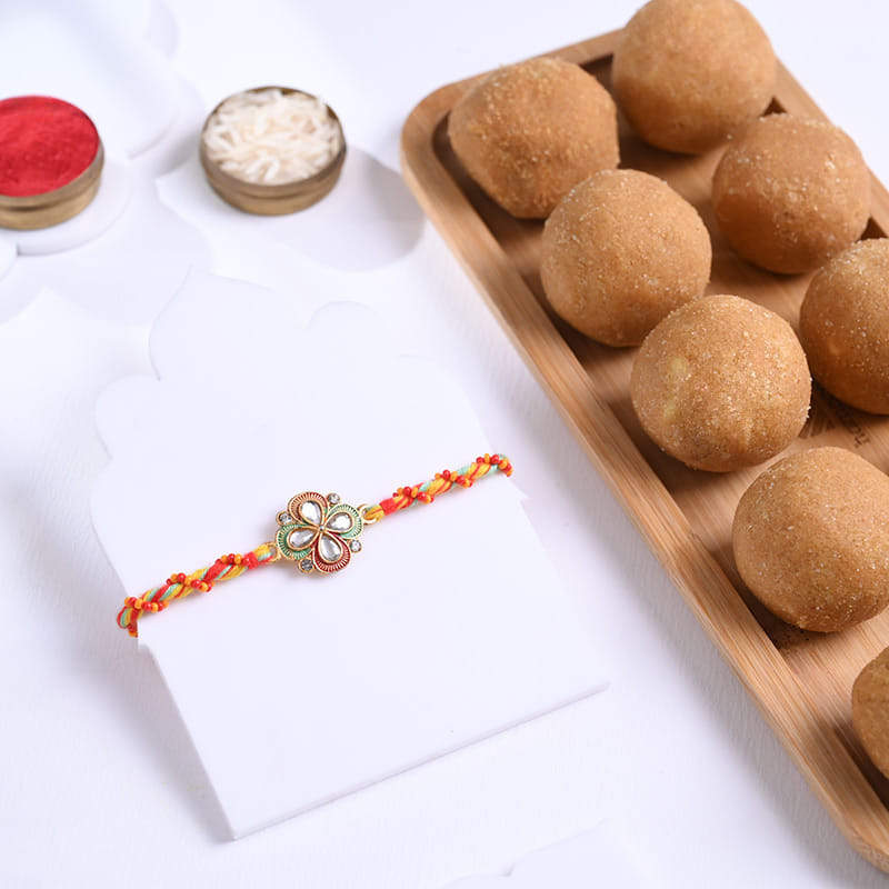 Red N Green Floral Kundan Rakhi With Besan Ladoos
