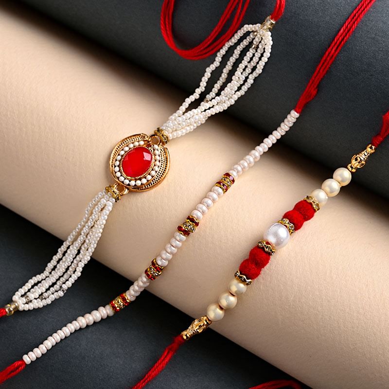 Buy Divine Rakhi for Brother Online - Red N White Rakhi Trio