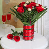 Arrangement of 8 Red Roses and 8 Ferrero Rochers in a Glass Vase
