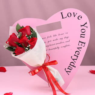 Red Roses Wrapped In Heartfelt Devotion