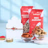 Order Red Stone Rakhi with Gourmet Dry Fruits Online