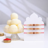 Red Thread Rudraksha Rakhi Trio with Rasgullas