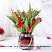 Red Tulips In A Rustic Embrace