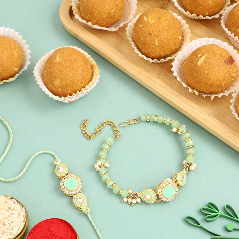 Regal Bhaiya Bhabhi Rakhi Set With Besan Ladoo