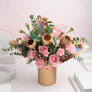 Regal Blooms In Golden Cylinder Pot