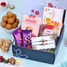 Regal Peacock Rakhi Duo With Sweets Hamper